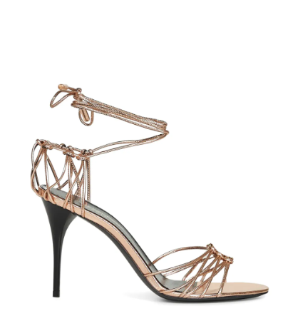 Elegant Saint Laurent Babylone strappy sandals, designed with sleek straps and a refined silhouette for a timeless, sophisticated look.